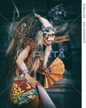 Dancer in traditional Balinese mask of demon 63258826