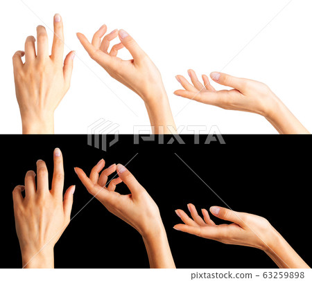 Woman hands with the index finger pointing up 63259898