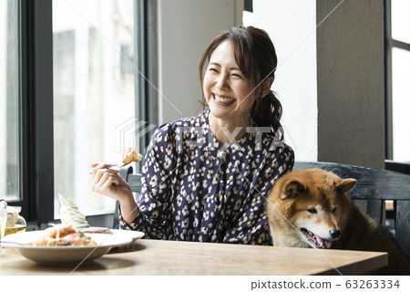 Dock cafe cafe dog woman Dock cafe cafe dog woman 63263334