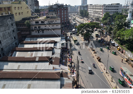 Dhaka, Bangladesh Cityscape around Motizir in central city Road with heavy traffic, old buildings and mosque Dhaka, Bangladesh Cityscape around Motizir in central city Road with heavy traffic, old buildings and mosque 63265035