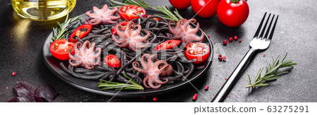 Black seafood pasta with shrimp and octopus 63275291