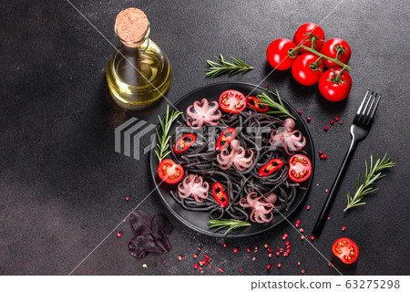 Black seafood pasta with shrimp and octopus 63275298