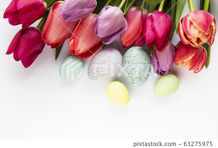 Spring tulips and easter eggs 63275975