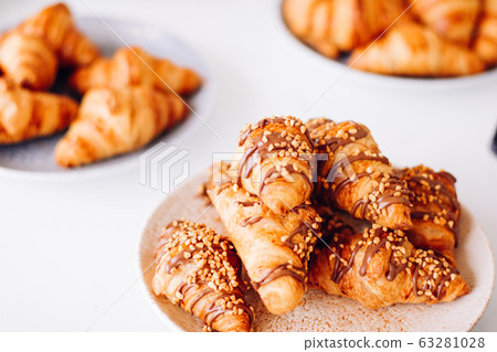 Pastry buffet served at charity event, sweet food and dessert table Pastry buffet served at charity event, sweet food and dessert table 63281028