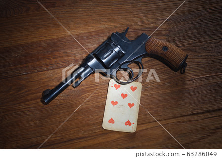 russian roulette - Seven of Hearts plaing card and 63286049