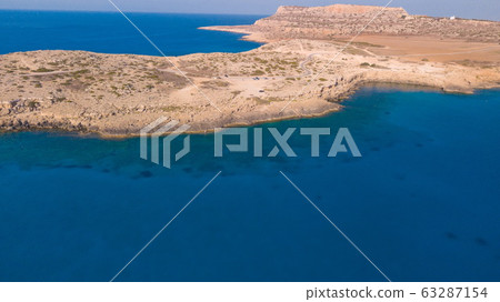 Clear blue water aerial Clear blue water aerial 63287154