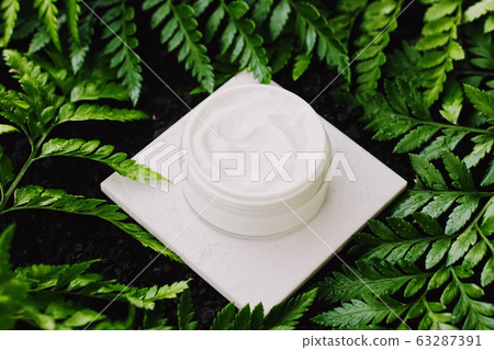 Face cream moisturizer jar in green garden, natural herbal skincare cosmetics and organic anti-aging product for health and beauty Face cream moisturizer jar in green garden, natural herbal skincare cosmetics and organic anti-aging product for health and beauty 63287391