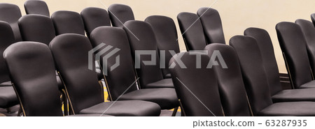 Empty chairs in a hotel conference room, business and interior design Empty chairs in a hotel conference room, business and interior design 63287935