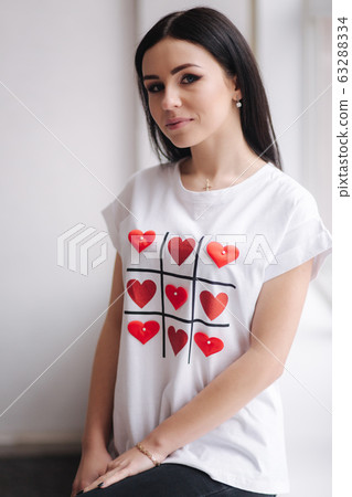 Attractive young model demonstrating clothes. Spring colections on elegant brunette woman 63288334