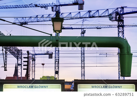 Construction of building with beautiful sky background Construction of building with beautiful sky background 63289751
