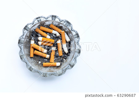 Smoked cigarettes on white background. 63290687