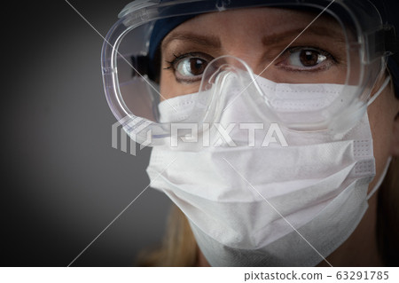 Female Lab Worker Wearing Protective Face Mask Female Lab Worker Wearing Protective Face Mask 63291785