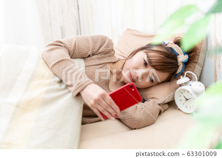 Woman in room wear Woman in room wear 63301009