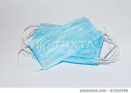 Protective medical mask on white background isolate Protective medical mask on white background isolate 63302046