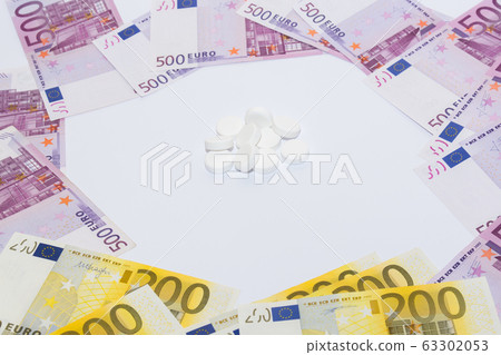 Tablets and euro bills. Expensive medicine concept. 63302053