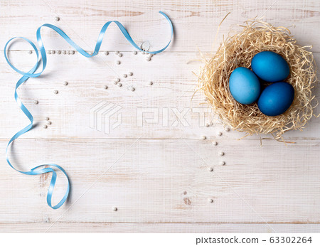 Easter concept, copy space, top view. Blue eggs Easter concept, copy space, top view. Blue eggs 63302264
