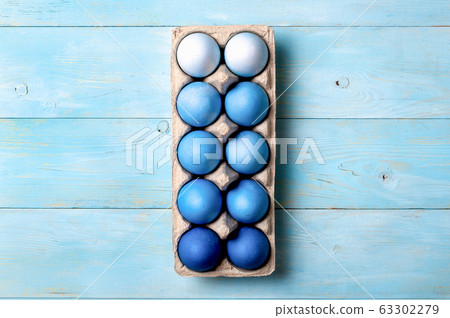 Blue ombre eggs as Easter 2020 concept Blue ombre eggs as Easter 2020 concept 63302279