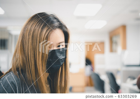 Woman wearing mask protection epidemic flu covid19 63303269