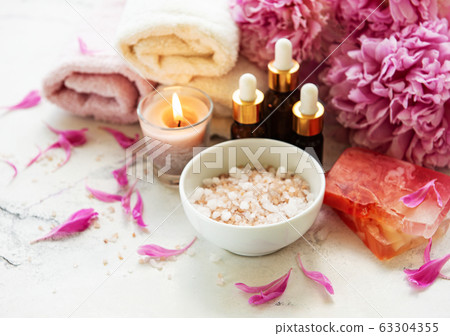 Spa concept with peonies Spa concept with peonies 63304355