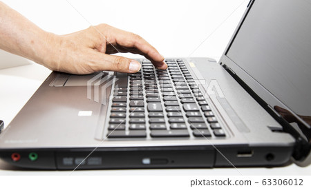 Computer person's hand 63306012