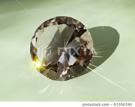 A diamond-cut stone in the natural rays of the 63306390