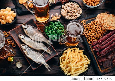 Set of appetizers, salty snacks and light beer Set of appetizers, salty snacks and light beer 63307520