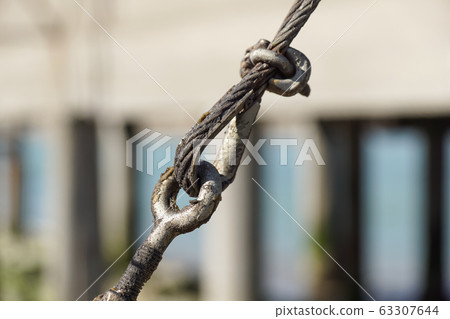 stainless steel turnbuckle hook and steel wire cable rope connection ties  and connections concept. bracing and securing concept. Stock Photo