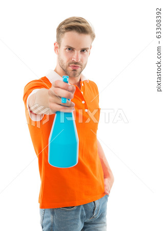 Refresh right now. Man hold mist sprayer like 63308392