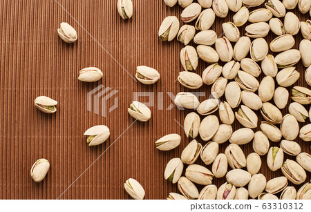 fresh pistachios close-up 63310312