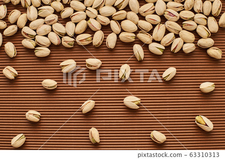 fresh pistachios close-up 63310313