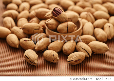 fresh pecan nut close-up 63310322