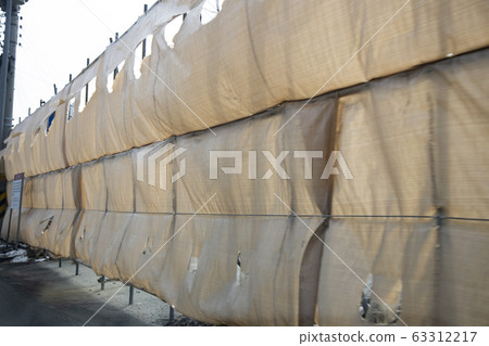 A barrier installed on the side of the road A barrier installed on the side of the road 63312217