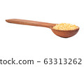 Brown sugar in spoon 63313262