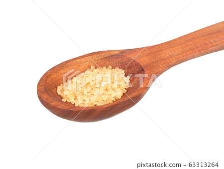 Brown sugar in spoon Brown sugar in spoon 63313264