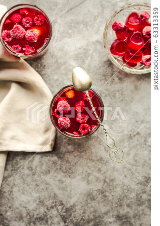 Berries in jelly pudding with fresh raspberries in 63313359