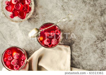 Berries in jelly pudding with fresh raspberries in 63313361
