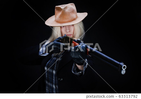 wild west blonde girl with rifle 63313792