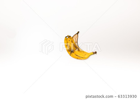 spoiled banana peel on an isolated white background 63313930