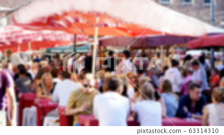 Beer festival in one of the European cities. Blurred view 63314310