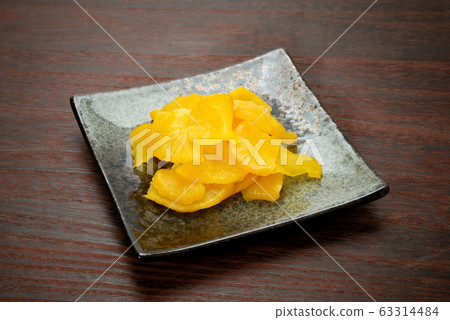 Pickled radish, pickled in a pot 63314484