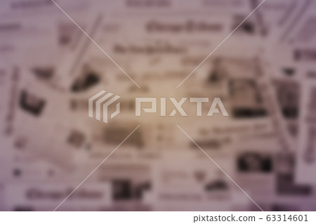 Lot of internet versions of the world's leading English newspapers background texture, blurred view 63314601