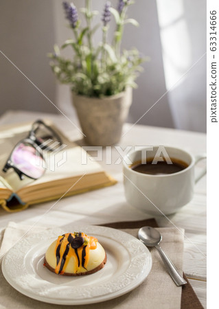 Still life with coffee, cake and a bouquet of Still life with coffee, cake and a bouquet of 63314666