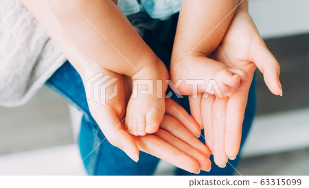 mother care tenderness love affection baby feet mother care tenderness love affection baby feet 63315099