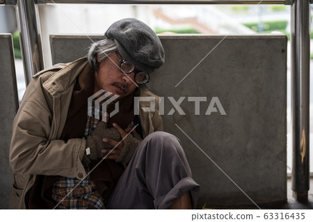 Homeless old man heart attack in city Homeless old man heart attack in city 63316435