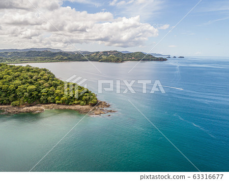 Aerial shot of the tropical beach Playa Arenillas in Costa Rica in peninsula Papagayo coast in guanacaste 63316677