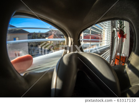View through protective mask and window on empty city. Coronavirus COVID-19 concept 63317110
