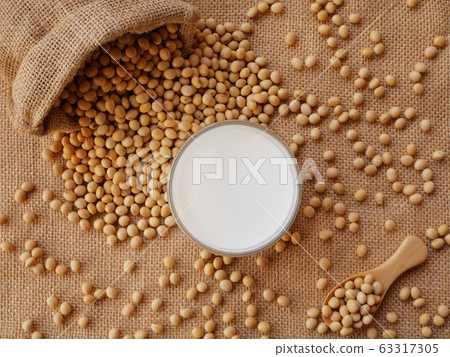 soy milk and soybean on the sack background soy milk and soybean on the sack background 63317305