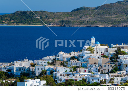View of Plaka village with traditional Greek church. Milos island, Greece 63318075