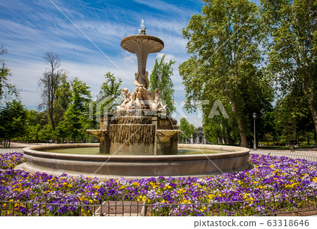 Galapagos Fountain or Isabel II Fountain a monumental fountain in Madrid located in the Retiro park Galapagos Fountain or Isabel II Fountain a monumental fountain in Madrid located in the Retiro park 63318646