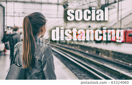 Coronavirus COVID-19 travel people crowd waiting at train station with SOCIAL DISTANCING text background. Social distance for public transport commute Coronavirus COVID-19 travel people crowd waiting at train station with SOCIAL DISTANCING text background. Social distance for public transport commute 63324060